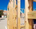 Close-up exterior wall timber framing studs beams posts of wooden mobile home, Church ministry project under construction Royalty Free Stock Photo