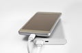 Close-up of  external battery that charges a discharged  mobile phone . Fast charging  powerbank electricity storage Royalty Free Stock Photo