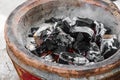 Close-up extinguish fire coal in stove Royalty Free Stock Photo