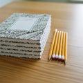 Stack of Notebooks and Pencils on Wooden Desk Royalty Free Stock Photo