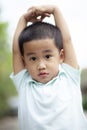 Close up face of asian children boy looking to camera with eye contact Royalty Free Stock Photo