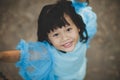 Close up face asian girl children toothy smiling face happiness emotion looking to camera Royalty Free Stock Photo