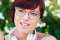 Close-up of the face of a beautiful woman with glasses and pretty green eyes Royalty Free Stock Photo