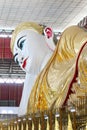 Close up of the face Buddha Chauk Htat Gyi Buddha sweet eye buddha is famous tourist attraction in Myanmar. Royalty Free Stock Photo