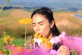 Close up face,caucasian woman and expression happiness,pretty girl with pink comos flowers Royalty Free Stock Photo