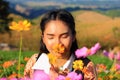 Close up face,caucasian woman and expression happiness,pretty girl with yellow and pink comos flowers Royalty Free Stock Photo