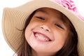 Close up face of happy, smiling female asian caucasian kid