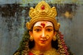 A close up on the face of an idol of Goddess Durga. Royalty Free Stock Photo