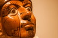 Close up of the face of a Inca statue.