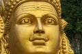 Close up of face of the Murugan Statue a Hindu deity at Batu Caves, Selangor, Kuala Lumpur Royalty Free Stock Photo
