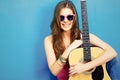 Close up face portrait of young woman with guitar Royalty Free Stock Photo