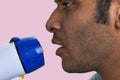 Close up face of southasian man with megaphone. Royalty Free Stock Photo