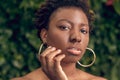 Close-up face of well-groomed dark-skinned woman