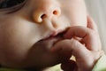 Close-up of the face of a worried baby, macro portrait Royalty Free Stock Photo