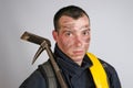 Close-up face of young brave man in uniform of firefighter and crowbar tool Royalty Free Stock Photo