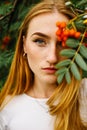 Close-up face of a young ginger ginger freckled woman with red hair and perfect healthy freckled skin Royalty Free Stock Photo