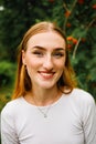 Close-up face of a young ginger ginger freckled woman with red hair and perfect healthy freckled skin Royalty Free Stock Photo