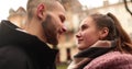 Close-up of the faces of a young couple in love kissing and hugging on the street Royalty Free Stock Photo