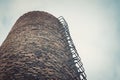 Close-up of factory brick chimney. Air Pollution by Industrial Emissions Royalty Free Stock Photo