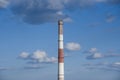 close-up factory brick chimney. pipe cogeneration plant on the sky background. Ambient air pollution industrial emissions Royalty Free Stock Photo