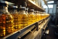 Close up of factory equipment Conveyor line filling bottles with sunflower and vegetable oil