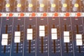 Close up fader of sound mixer old Volume adjusting knobs controller in control room