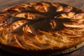 close-up failed apple pie. burnt on top and the dough did not rise during baking.