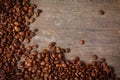 Coffee beans on dirty wooden desk Royalty Free Stock Photo