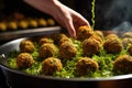 close-up of a falafel ball being formed