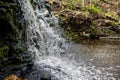 Closeup of falling and splashing streams of water, Ivande waterfall, Latvia Royalty Free Stock Photo