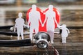 Close-up Of Family Cut Out And Red Heart Royalty Free Stock Photo