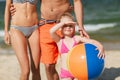 Close up of family with inflatable ball on beach Royalty Free Stock Photo