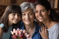 Portrait of happy three generations of women posing Royalty Free Stock Photo