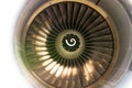 Close up of fan engine and turbine blades of modern civil passenger airplane illuminated beautiful light