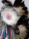 Close Up of Fancy Dancer at Pow Wow with Feather Headdress and Bustle Royalty Free Stock Photo