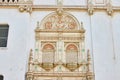 Close up of fancy golden and pastel green elaborate wall of city hall building in San Francisco