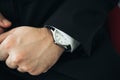 A closeup of a watch with leather bracelet on man`s hand Royalty Free Stock Photo