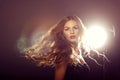 Close up fashion model girl portrait with long blowing hair. Royalty Free Stock Photo