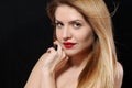 close up fashion portrait of beautiful young blonde woman on black background Royalty Free Stock Photo