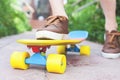 Close-up fashion skateboarder riding skateboard outdoor