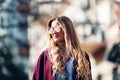 Close up fashion street stile portrait of pretty girl in fall casual outfit Beautiful blond posing outdoor. Royalty Free Stock Photo