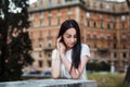 Close-up Fashion woman portrait of young pretty trendy girl posing at the city in Europe, summer street fashion Royalty Free Stock Photo