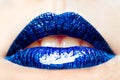 Close-up of fashion womanish blue lips a gloss Royalty Free Stock Photo