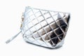 Close up fashionable metallic hand bag isolated. Elegance woman accessory for shopping or travel. Isolated object on a white backg Royalty Free Stock Photo