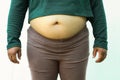 Close-up of fat woman on white background. Concept for obesity issue, diet of food for health Royalty Free Stock Photo