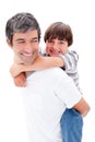 Close-up of father giving his son piggyback ride Royalty Free Stock Photo
