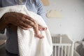 Close Up Of Father Holding Newborn Baby Son In Nursery Royalty Free Stock Photo