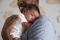 Close Up Of Father Holding Newborn Baby Son In Nursery Royalty Free Stock Photo