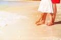 Close up of father and little daughter feet on beach Royalty Free Stock Photo