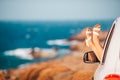 Closeup of little girl feet showing from car window Royalty Free Stock Photo